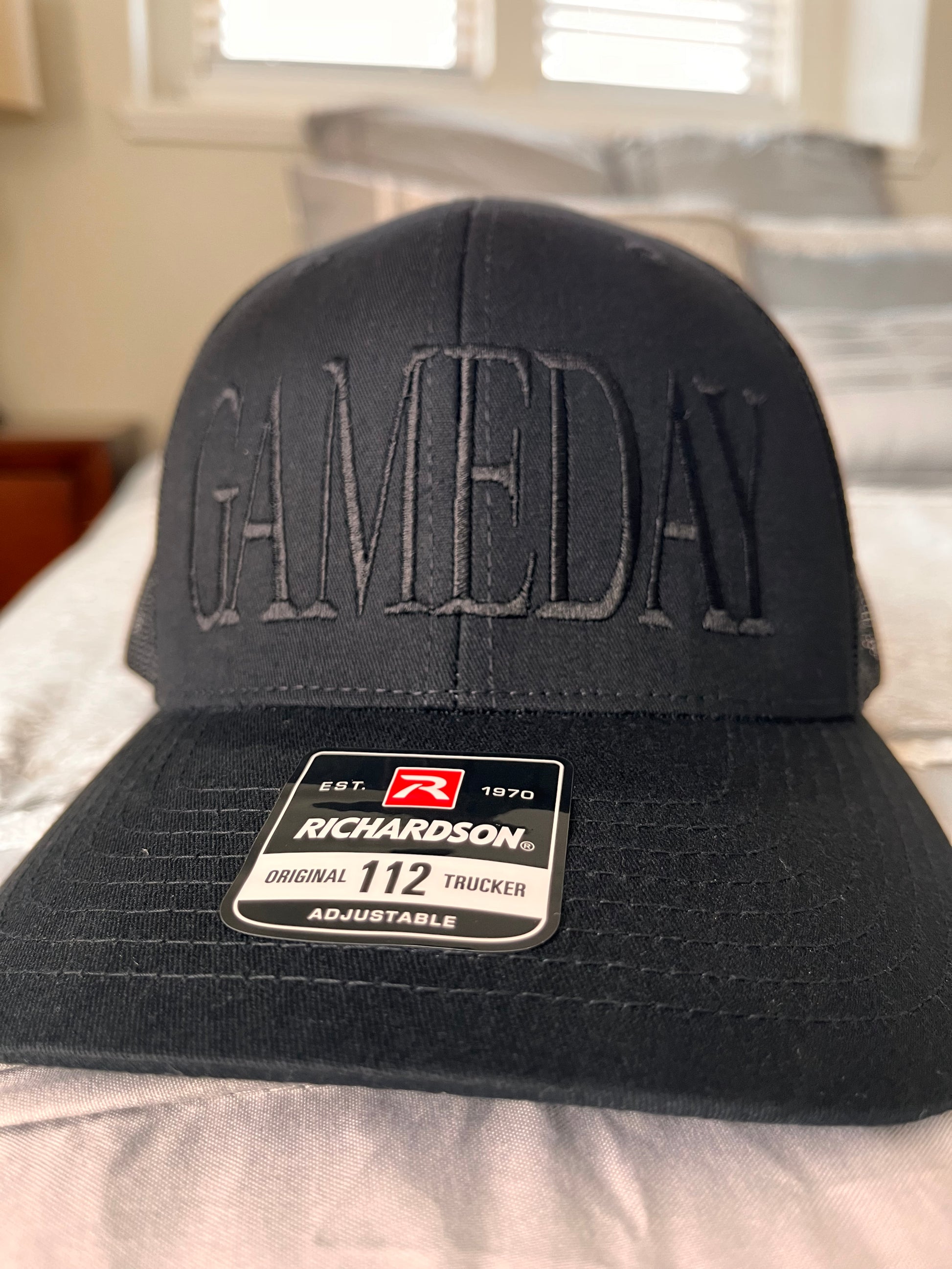 GAMEDAY embroidered hat- Richardson  112 Trucker hat black on black