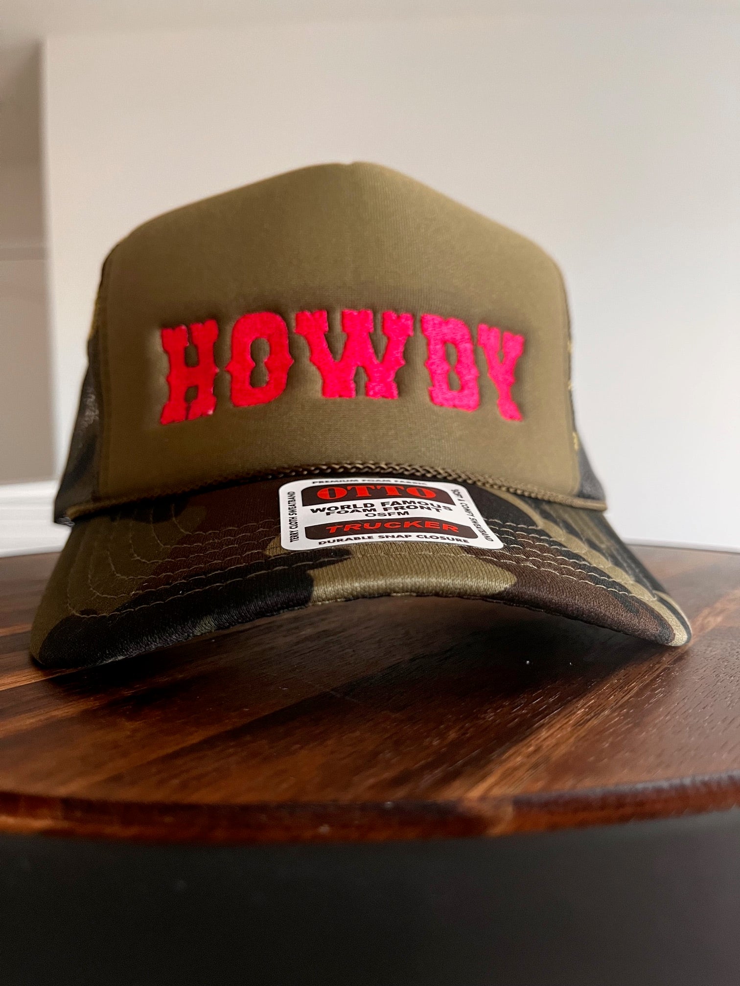 HOWDY Embroidered Otto Foam front Trucker Hat in camo