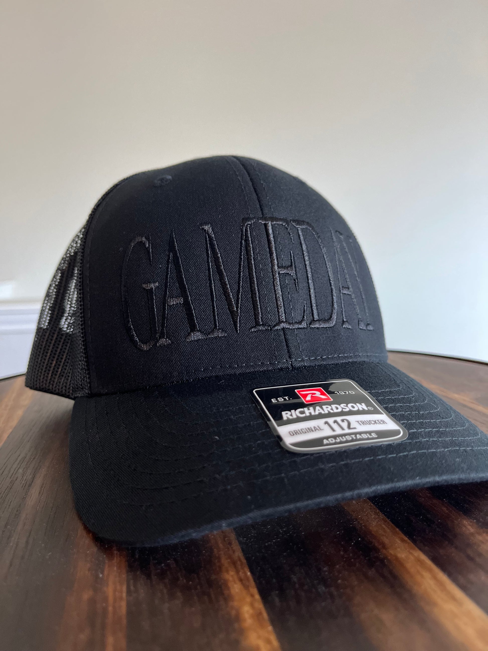 GAMEDAY embroidered hat- Richardson  112 Trucker hat black on black