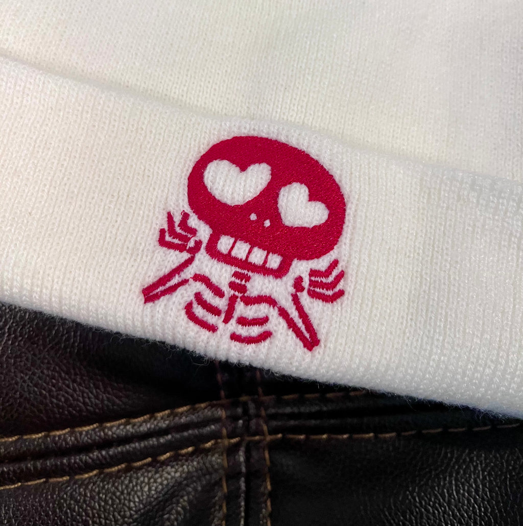 Valentine’s Day Skull Beanie – Heart Eyes Skeleton Embroidered Hat